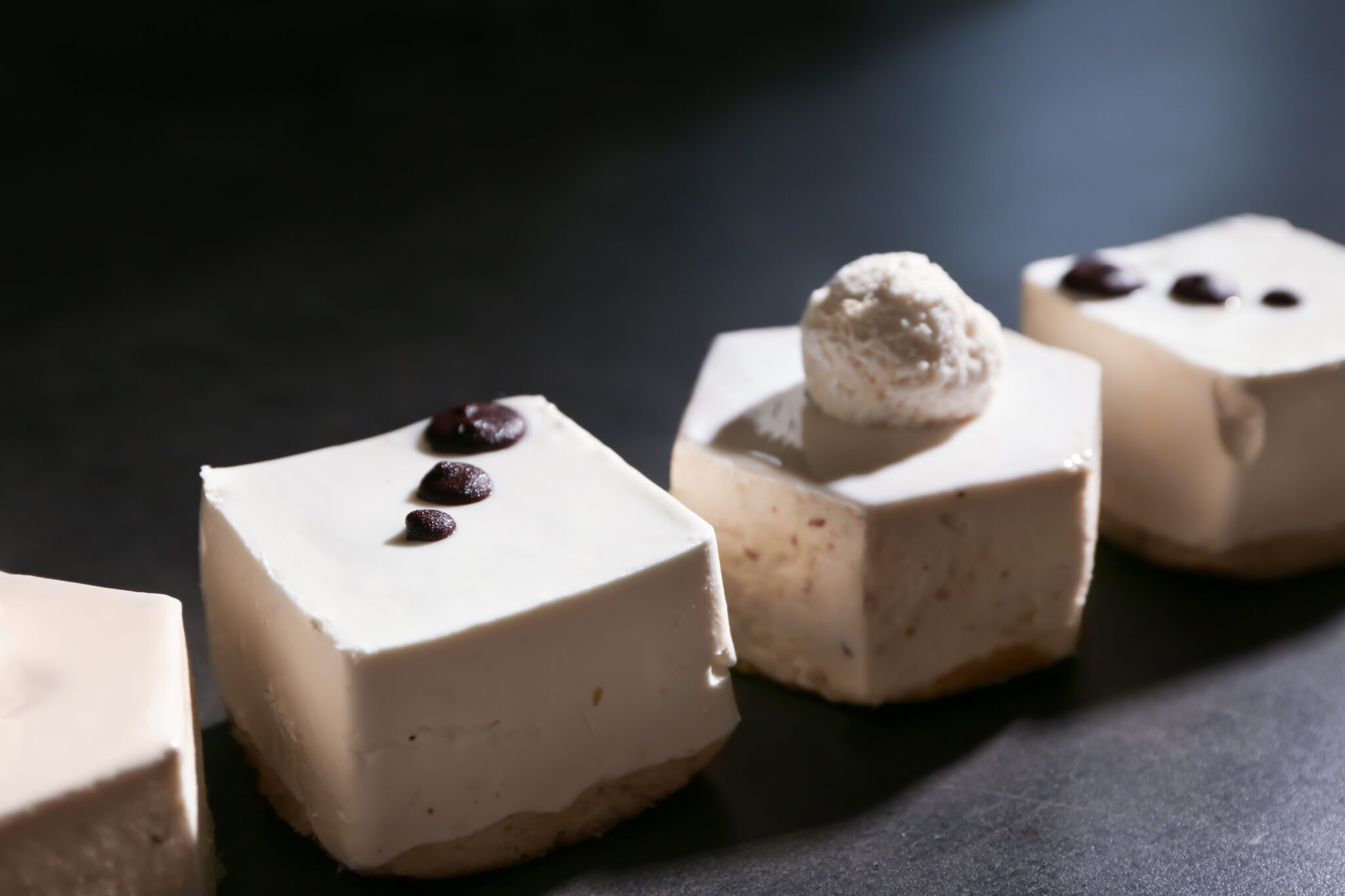 Tasty souffle cakes on dark background